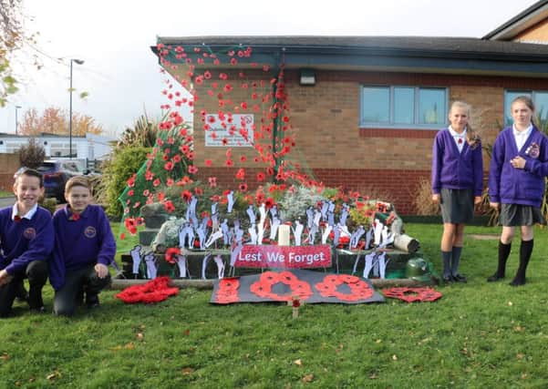 Dubmire Academy pupils with their Remembrance tribute.
