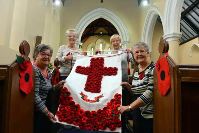 All Saints Ladies Fellowship knitted poppies for All Saints Church service.
From left Ann Jeffrey, Linda Hughes, Doreen Crofts and Evelyn Gardner