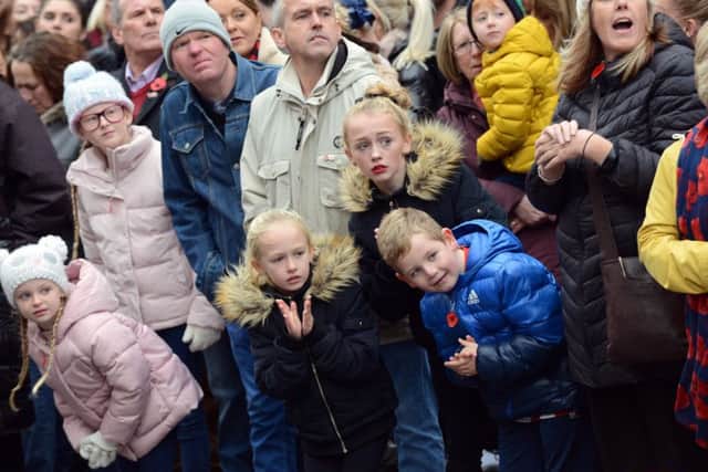 Crowds of all ages lined the streets