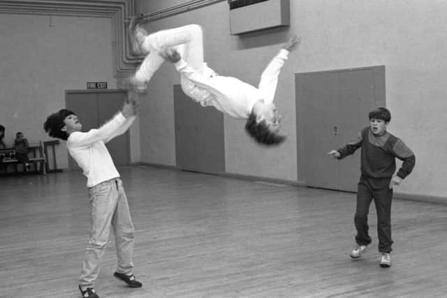Three of Sunderlands breakdancers in action.