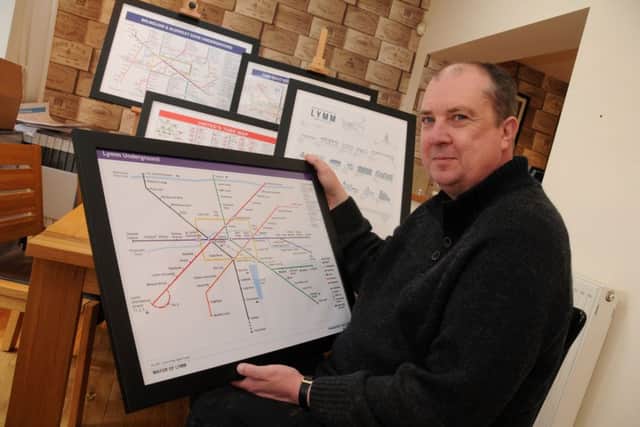 Mike Cochrane with one of his London Underground-style maps.