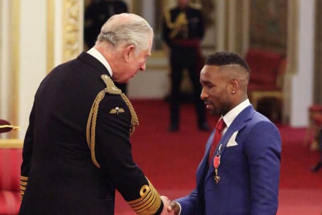 Jermain Defoe receives his OBE from Prince Charles at Buckingham Palace today. Pic: Jonathan Brady/PA Wire.