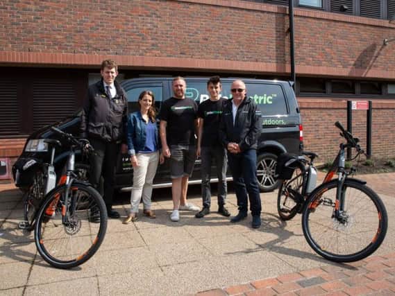 Gateshead Council employees with the men behind Ride Electric after the authority signed up to use the environmentally friendly eBikes.