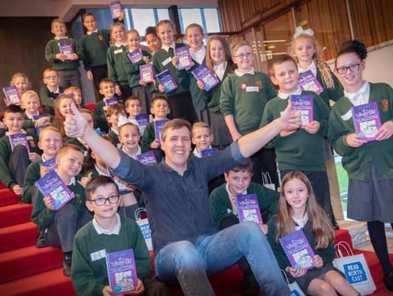 Author Jeff Kinney and the pupils from Broadway Junior School in Sunderland