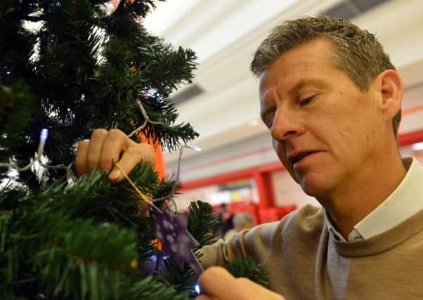 Steve Cram launches the St Benedict's Hospice Dedication Christmas Tree at The Bridges.