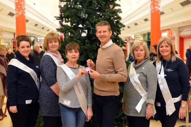 Launches of the St Benedict's Hospice Dedication Christmas Tree at The Bridges.. From left sponsor ResQ Nicola Usher, hospice volunteer Judith Stout, hospice head of fundraising Catrina Flynn, Steve Cram, hospice volunteer Annette Murray and sponsor ResQ Sue Guthrie