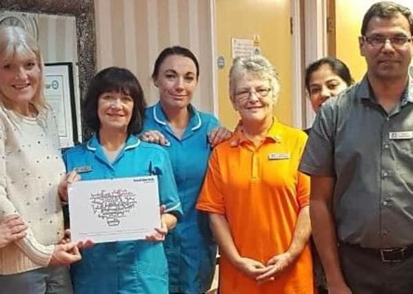 The Marigold Nursing Home team with their award from Sunderland Healthwatch.