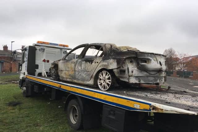 A wrecked car is taken away from the scene of the blaze in Southwick. Photo by BBC Newcastle.