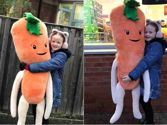 Maizie Anderson with Kevin the Carrot. Picture: Ashley Ambler Anderson.