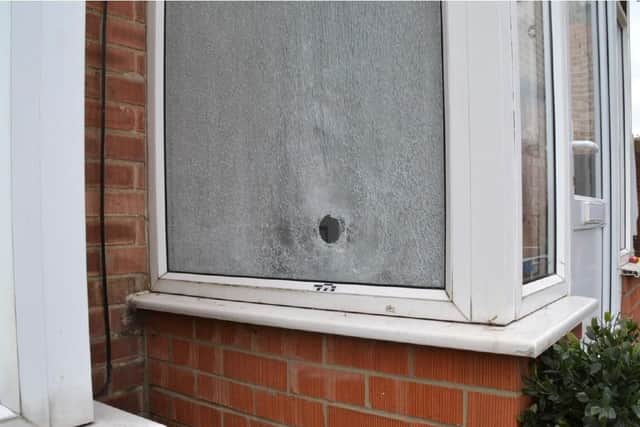Damage caused to the house in Craigshaw Square after the shooting
