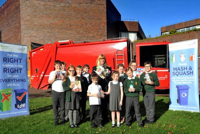 Coun Amy Wilson meets children from Broadway Juniors at the Civic Centre for a closer look at a recycling vehicle.