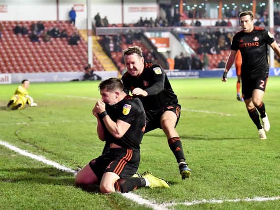 Lynden Gooch celebrates his late goal against Walsall.