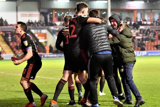 Sunderland fans and players celebrate the late goal. Pictures by Frank Reid.