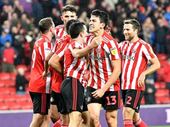 Luke O'Nien celebrates Sunderland's fourth goal against Barnsley