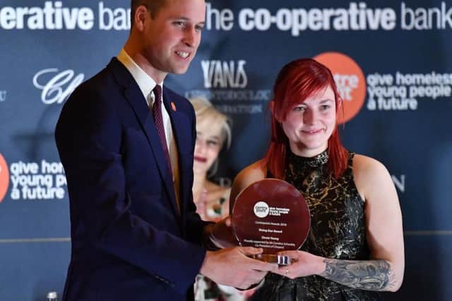 The Duke of Cambridge presenting the Centrepoint Rising Star Award to Zinnia Young at Kensington Palace in London earlier this year. Pic: Ben Stansall/PA Wire.