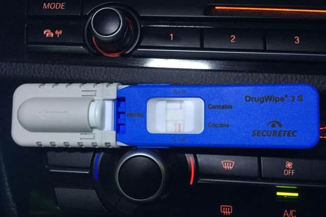Drug testing kits being used by officers as part of drink and drug driving crackdown