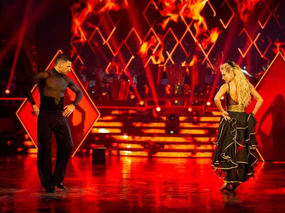 Faye Tozer and Giovanni Pernice perform the paso doble. Picture: Guy Levy/BBC/PA.