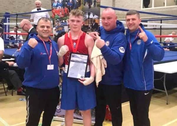 Jack Atkinson with his Sunderland ABC coaches Dean Hassan, Joe Purvis and Rob Harrison.