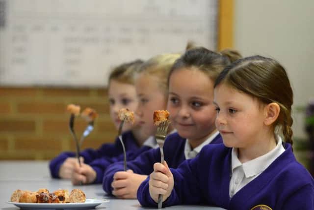 Paige Simpson and her fellow pupils at Dubmire Academy tucked into a serving of her sausages after she was presented with her prizes.