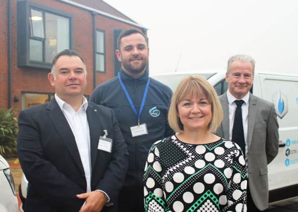 (from left) Neil Henry and Daniel Rosindale of HLA Services, Victoria Brown from Grace House and MacDonald Martins Andy Trafford.