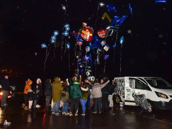 Friends and family let off balloons to pay tribute to Sheldon Gary Farnell