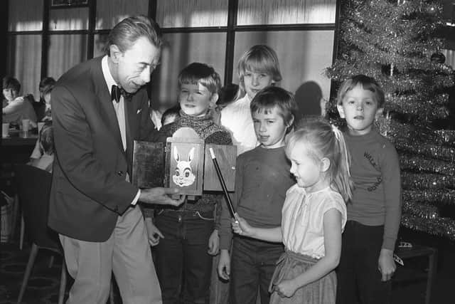 The breakfast in 1980 with a magician entertaining the children.