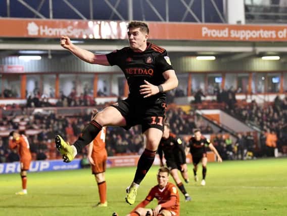 Lynden Gooch celebrates his late equaliser at Walsall.