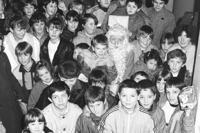 Santa Claus comes to town in December 1986.