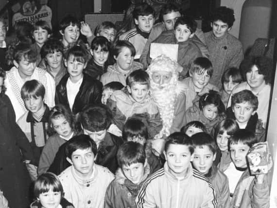 Santa Claus comes to town in December 1986.