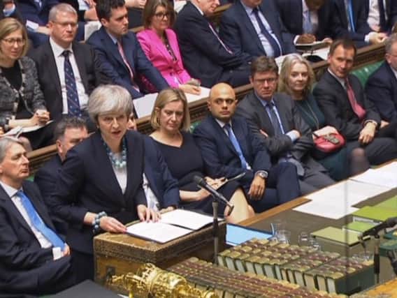 Prime Minister Theresa May making a statement in the House of Commons, London, where she told MPs that tomorrow's "meaningful vote" on her Brexit deal had been deferred. Photo by Press Association.