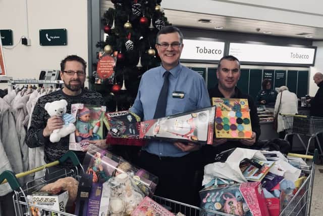 Jeff Williams,  Neil Thornton, Cliff Rudling, from Morrisons Doxford Park, with toys for the Sunderland Echo Toy Appeal 2018