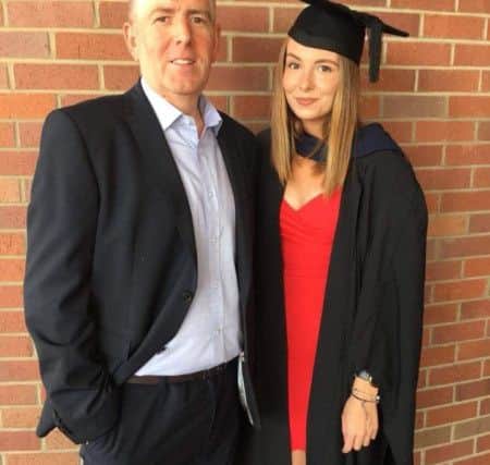 Trevor Corner with daughter Amy at her graduation.