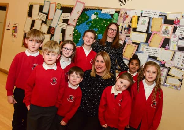Head teacher at St Pauls C of E Primary School, Ryhope, Lisa Quinn-Briton and her deputy Jackie Graham with pupils, celebrating their Outstanding Ofsted report.