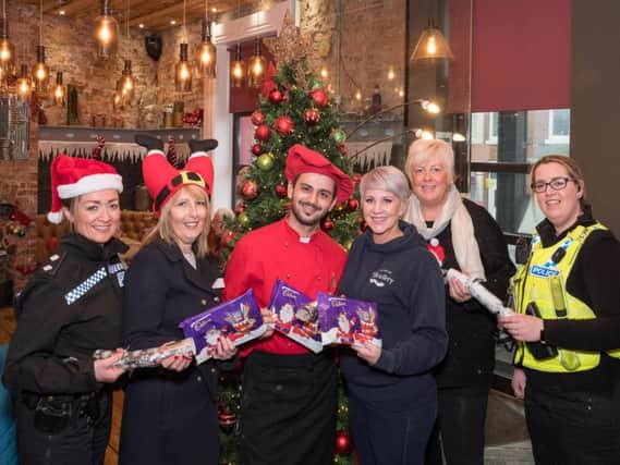 Scullery owner, Haley Tuckwell, with The Scullery Head Chef, and staff from Gentoo Group and Northumbria Police