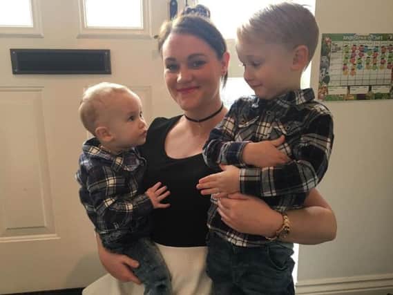 Suzie Purvis with sons Jude, two, and Theo, four.