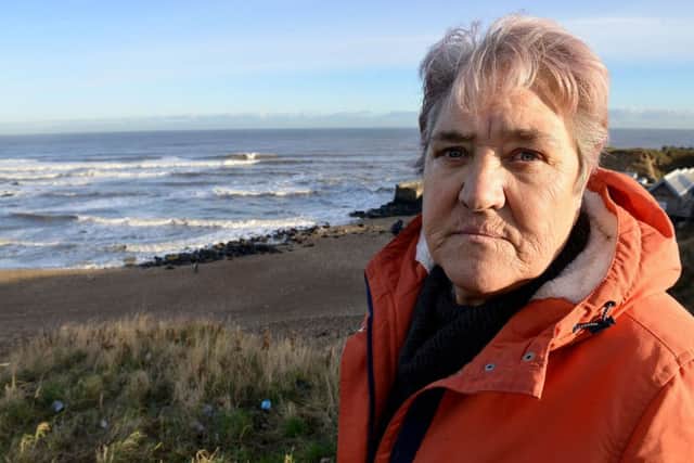 Pearl Smith overlooking the point at Seaham where she believes the remains of her missing Kayaker son Shame remain trapped under water. Picture by FRANK REID