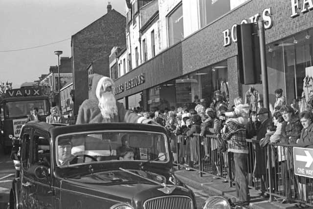 The Joplings Santa Parade took a route past Books Fashions in 1982.