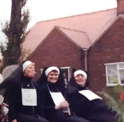 Nuns on parade, including Peter Barella on the right.