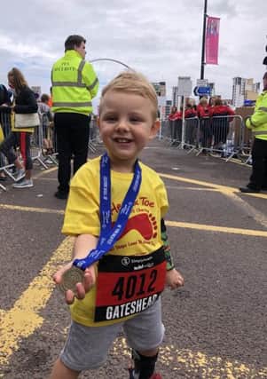 Hunter is so proud after completing the Mini Great North Run