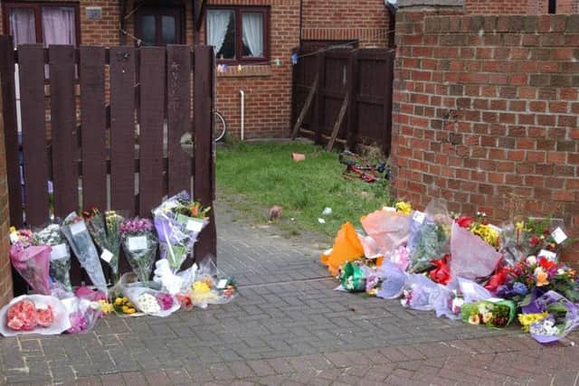 Flowers at the scene of the murder of Scott Pritchard at Lindsay Close, Hendon.
