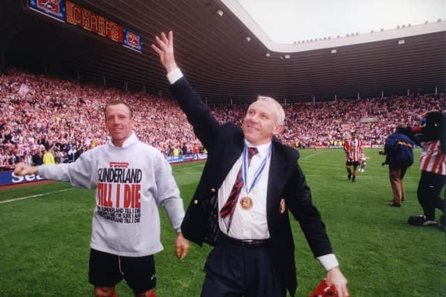 Peter Reid celebrates promotion to the Premier League with Sunderland skipper Kevin Ball back in 1999.