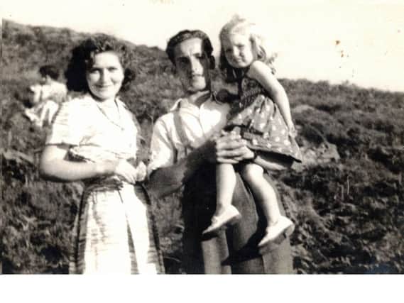 Ada and Arthur Laws are pictured on holiday with their daughter Sandra.