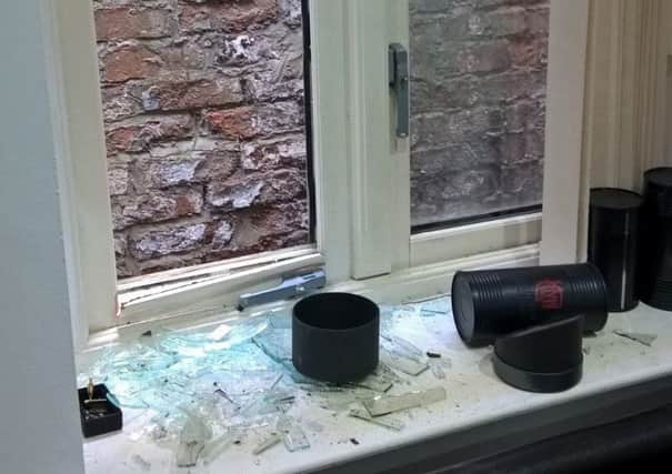 The smashed window where the burglar gained access to the flat on West Sunniside, Sunderland.