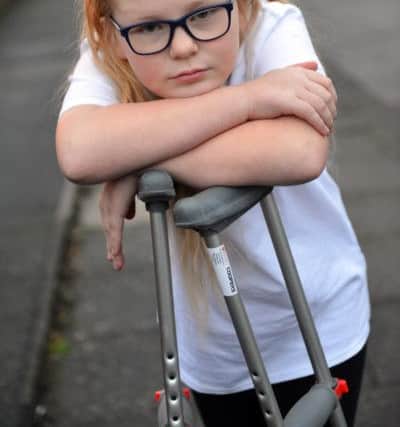 Bobbie Tighe, 10, is still reliant on crutches weeks after the incident.