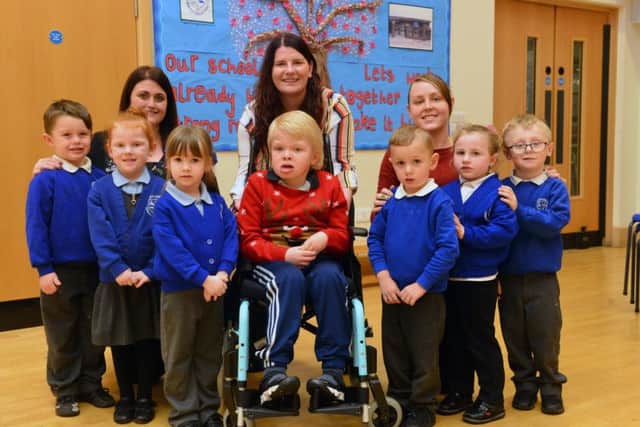 Southwick Community School fundraiser for Grace House.
Early Years children with Jack Watson from Grace House. 
On the back row, from left to right, are teacher Angela Wake, Grace House manager Emma Charlton and teacher Rachel Scott.