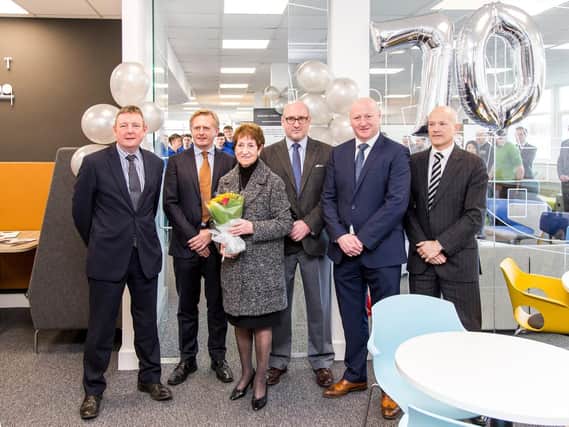 Mayor of North Tyneside Norma Redfearn with staff from Godfrey Syrett at the opening of its showroom to mark its 70th anniversary in 2017