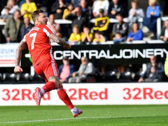 Chris Maguire celebrates stunning goal at Burton Albion