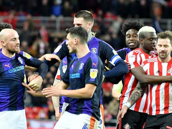 Sunderland are set to appeal Chris Maguire's red card