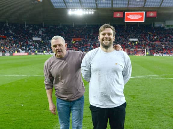Dad Ralphy Lane with son Iain Lane at the Stadium of Light after taking part in the half-time entertainment challenge. Photo by SAFC club photographer Alan Hewson.