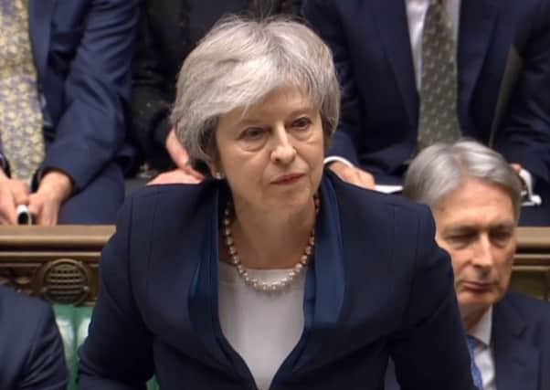Prime Minister Theresa May speaks after losing a vote on her Brexit deal in the House of Commons. Picture by House of Commons/PA Wire